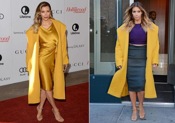 KUL I GUL: Kardashian har flere ganger brukt denne gule kåpen fra motehuset Max Mara, og kombinert ytterplagget med både skjørt og kjoler. Foto: Getty Images/ All Over Press