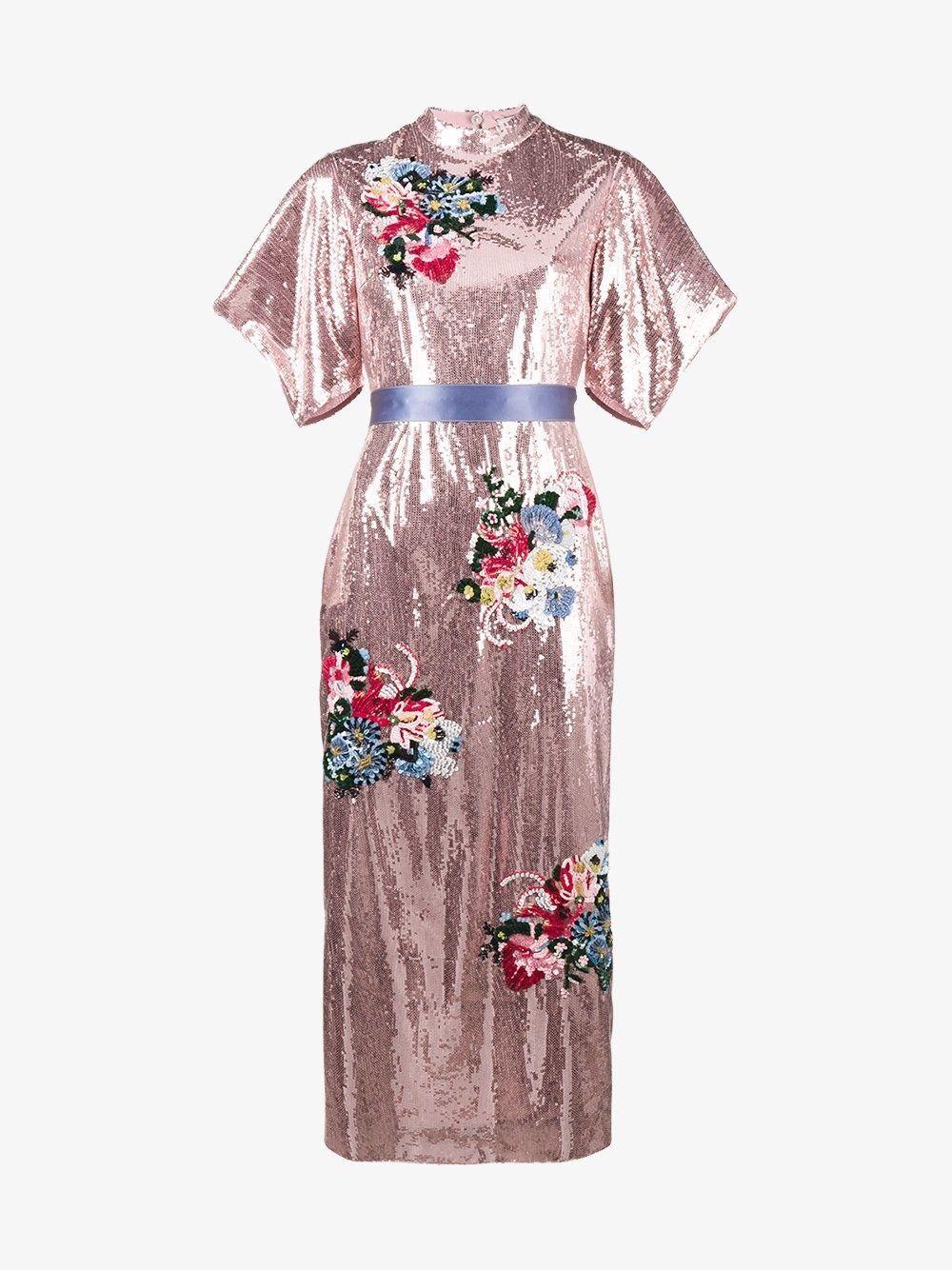 DETALJRIK: Dette er kjolen Melania Trump brukte for å feire det nye året. Foto: Produsenten.