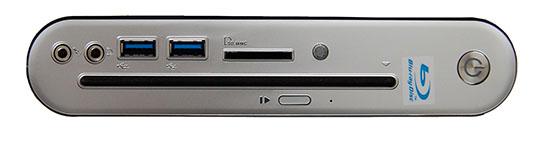 Foran: Hodetelefonutgang, mikrofoninngang, 2 x USB 3.0, Minnekortleser og slot-in for optisk stasjon