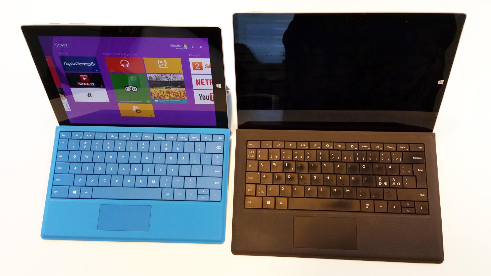 Microsoft Surface Pro 3 (til høyre) har fått en lillebror. Den er atskillig rimeligere, men kjører likevel full Windows 8.1, og har samme skjermpenn som Pro-modellen. Foto: Espen Irwing Swang, Tek.no