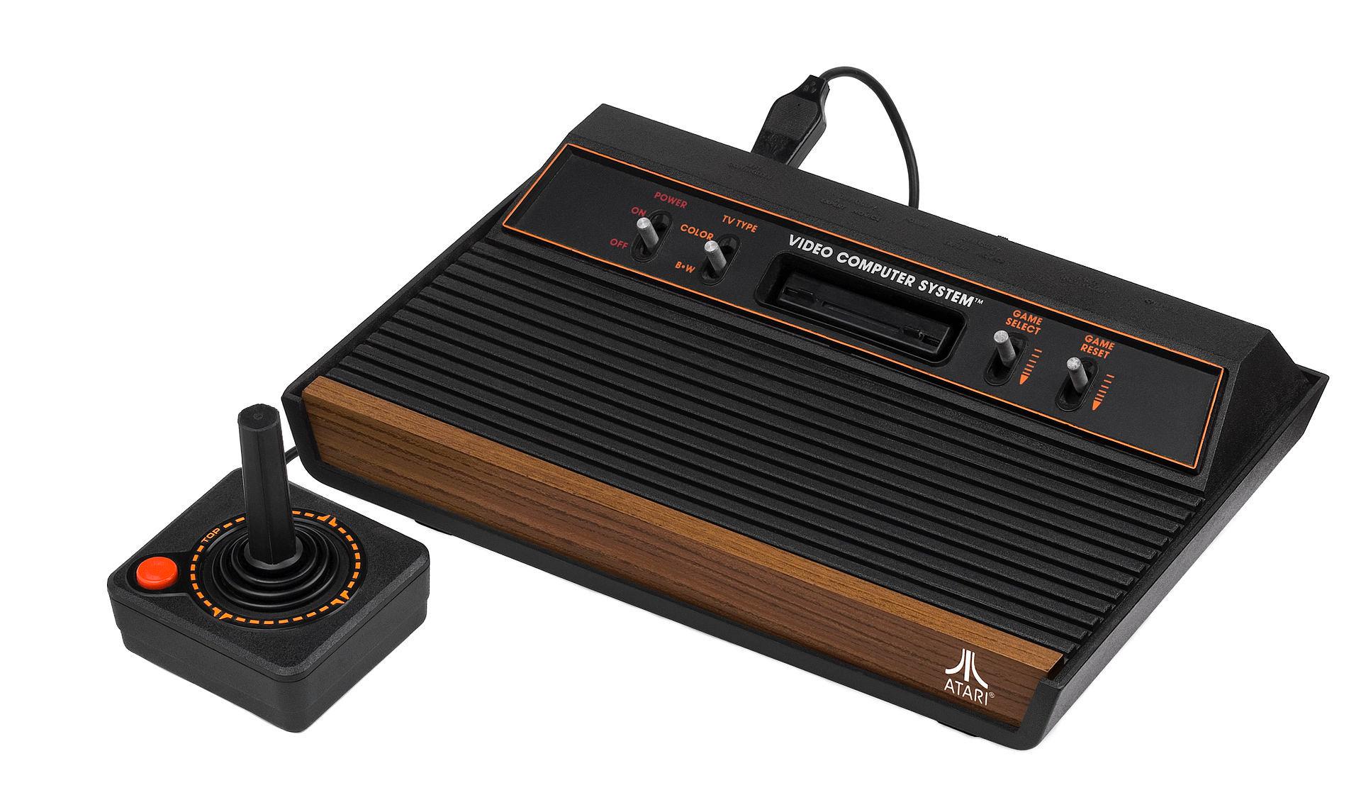 A complete Atari 2600 VCS console with joystick attached.