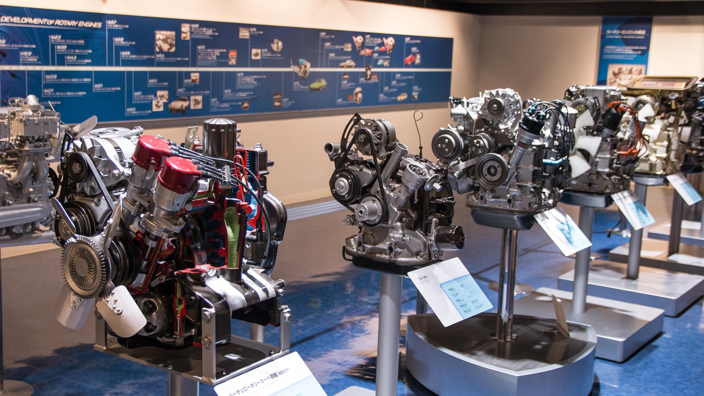 Et utvalg av Mazda sine Wankel-motorer fra opp gjennom årene. Denne teknologien er årsaken til at Mazda eksisterer som et uavhengig selskap i dag.Foto: Varg Aamo, Hardware.no