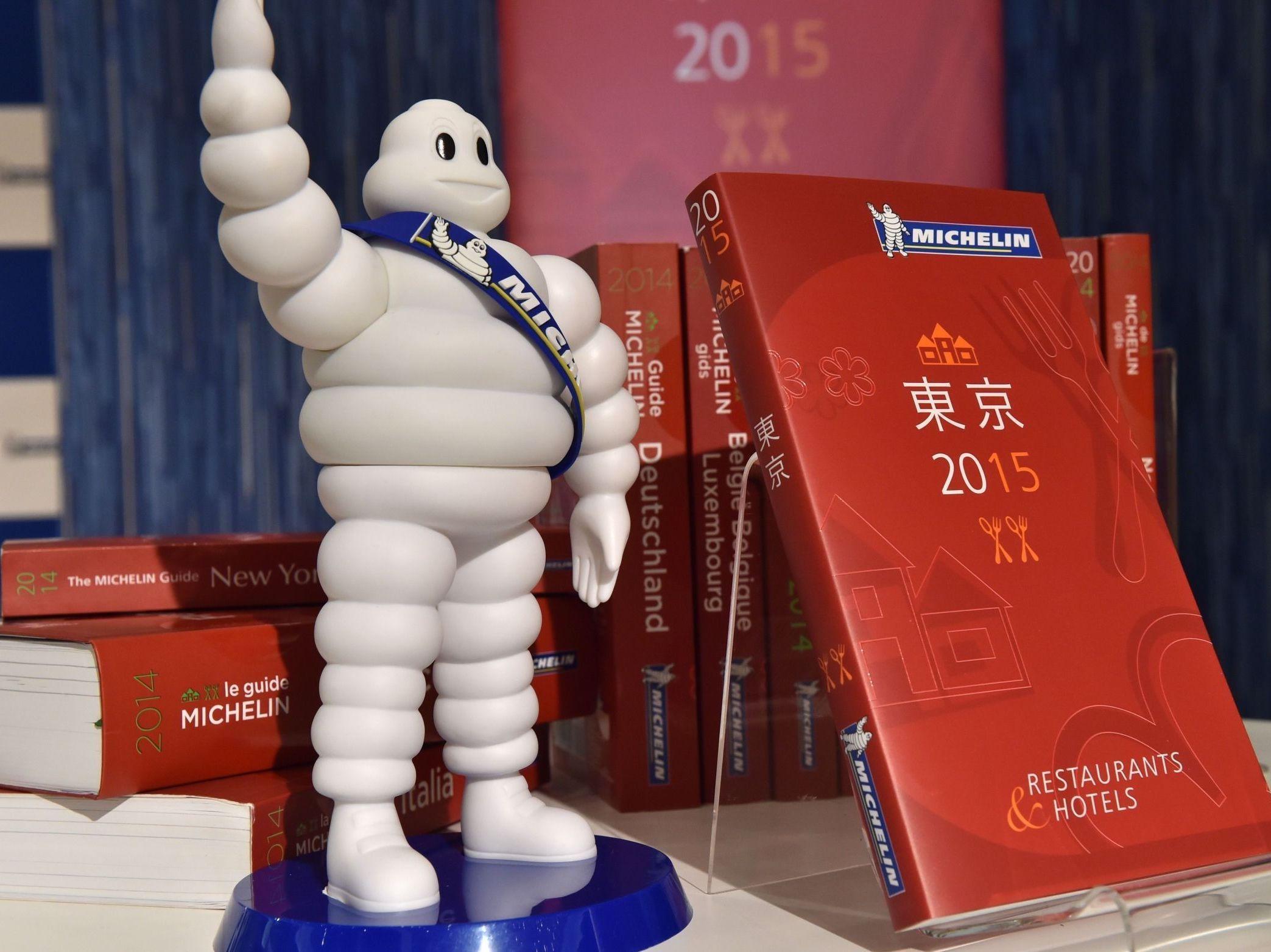 STJERNESPILL: Michelin-mannen er symbolet for både dekk og restaurant-guide. Foto: Yoshikazu Tsuno/Afp