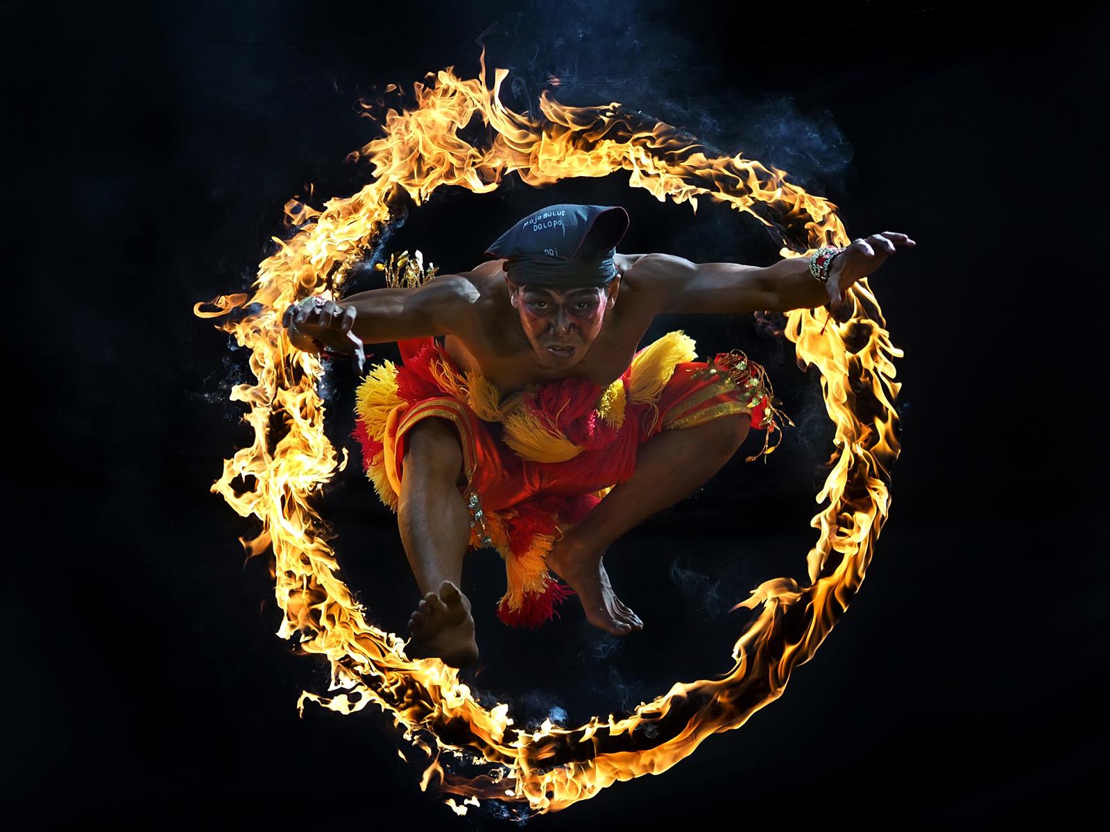 One of traditional attraction in Indonesia Culture called Bujang Ganong. He jumped into the circle of fire. Foto: Aprison Aprison, Indonesia, Shortlist, Arts&Culture, Open, 2015 Sony World Photography Awards