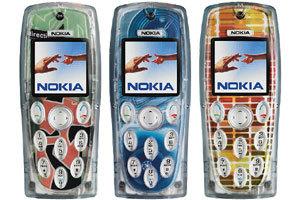 Du kunne klippe til dine egne bilder for å ha under de transparente dekslene på Nokia 3200.