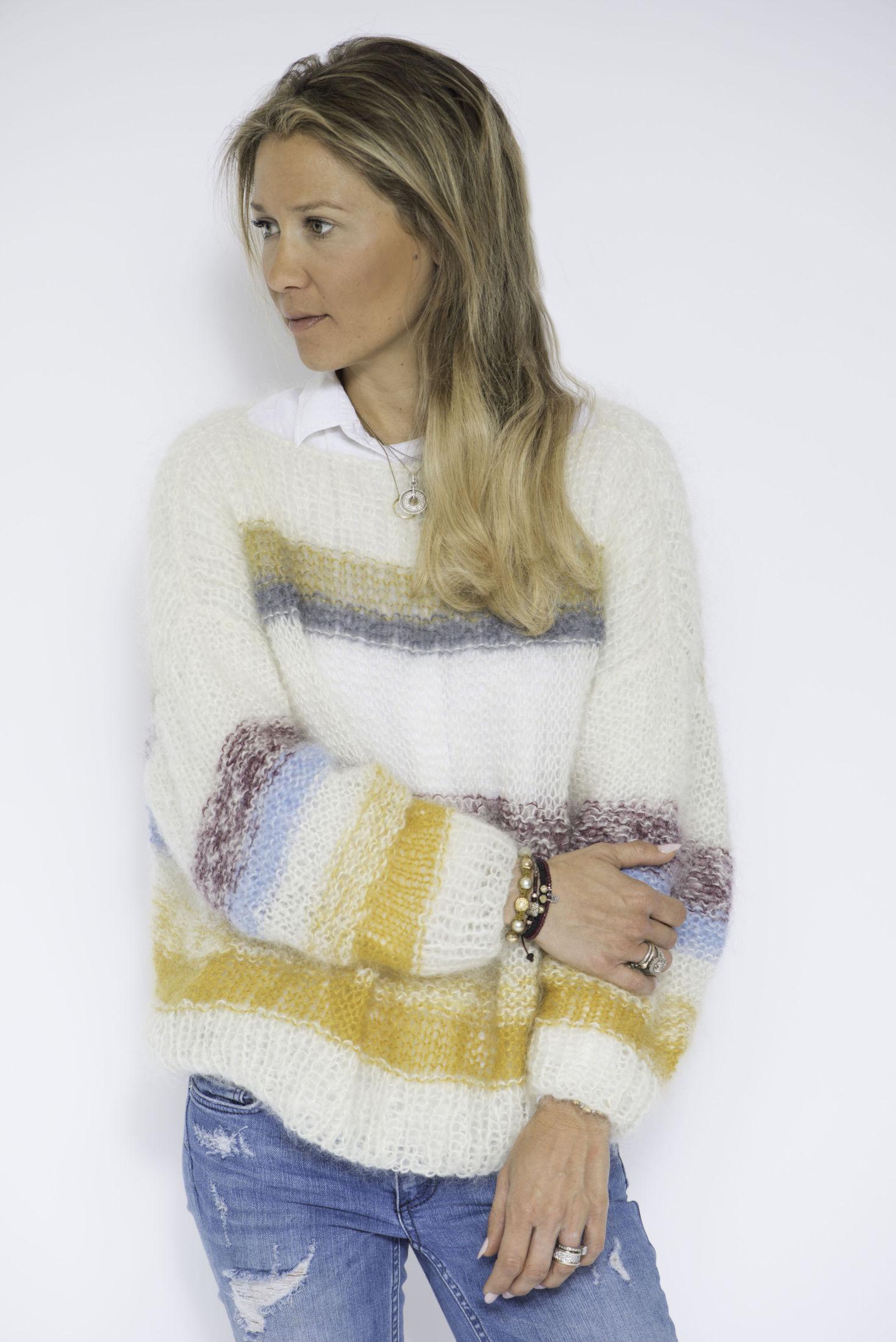 STOLT: Line Langmo synes det er gøy at så mange har strikket genseren hennes og synes det er ekstra stas at genseren nå kanskje dukker opp i «Snømannen». Foto: linelangmo.no