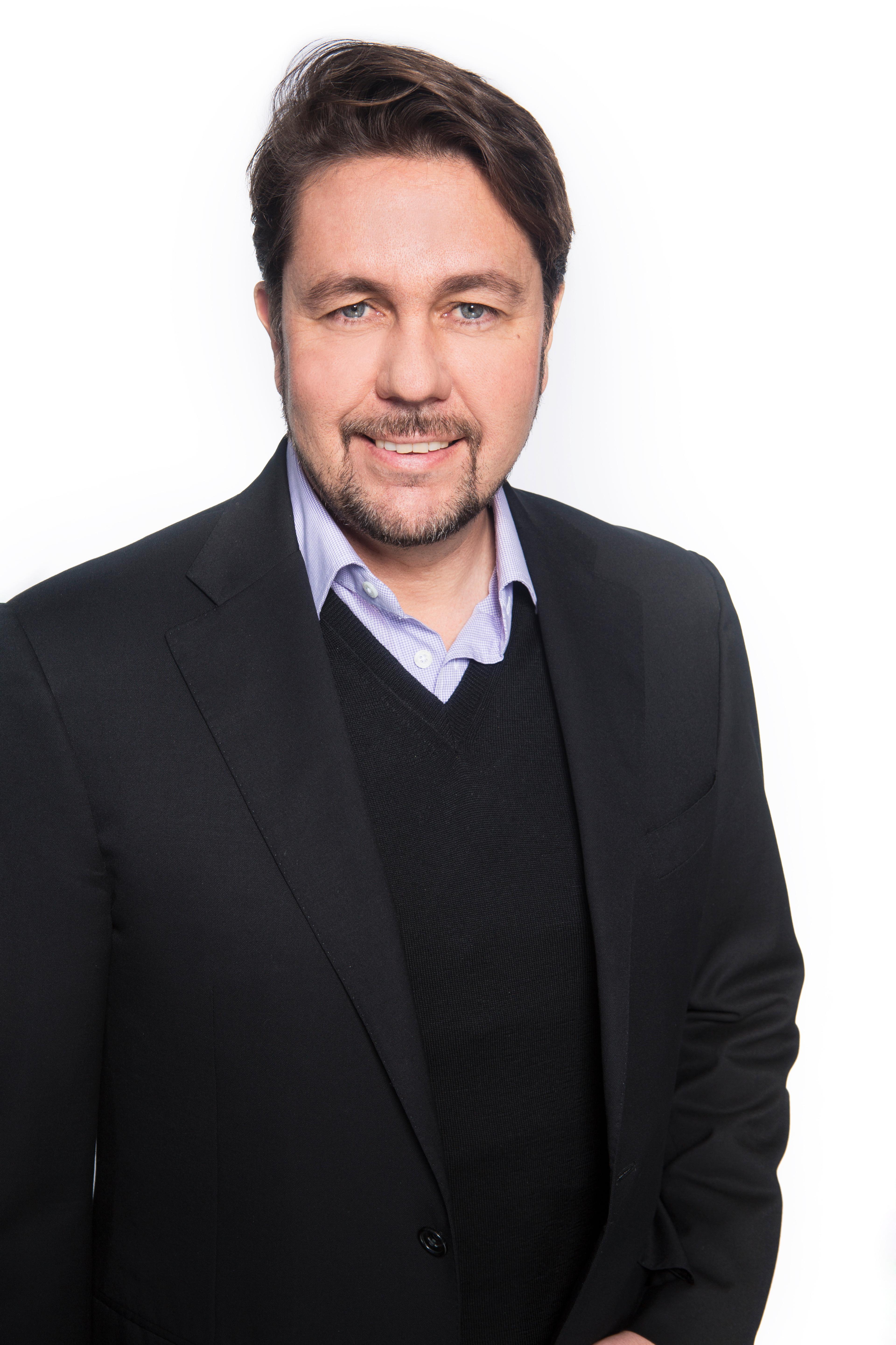 Arild Hustad, administrerende direktør for Tele2s norske virksomheter. Foto: Tele 2