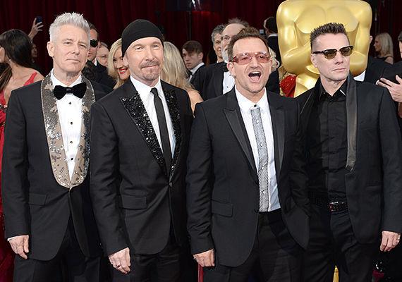 PRØVER FOR HARDT: minMote-redaksjonen digger U2, men dessverre er det ikke sammenheng med den prisbelønnede musikken og bandets Oscar-antrekk. Foto: NTB Scanpix