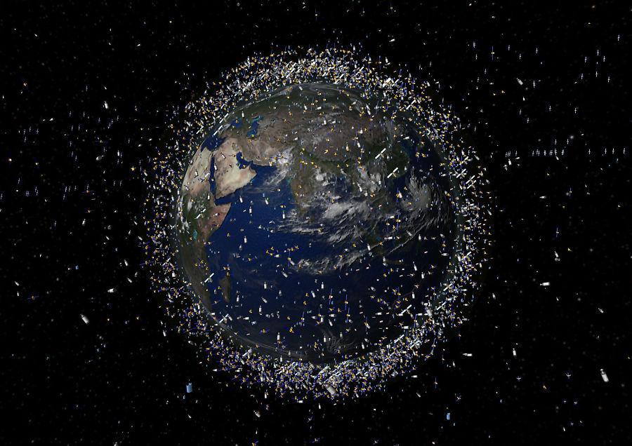 ROMSKRAP: Illustrasjonen viser satellitter og romsøppel i bane rundt jorda. Kan Kosmos 2499 rett og slett rydde rommet?