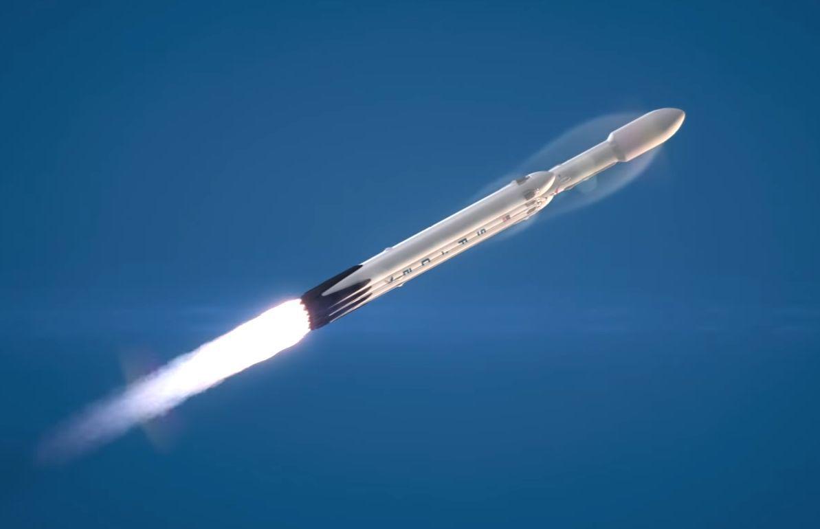 Den private turen til Månen vil benytte SpaceX' nye rakett Falcon Heavy, her avbildet i en animasjon.