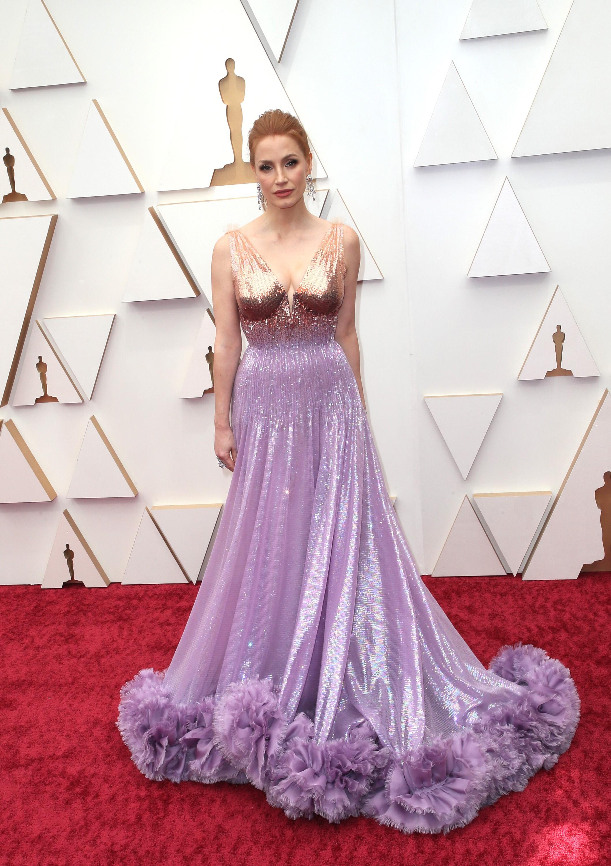 VINNER: Jessica Chastain i en glitrende kjole fra Gucci. Hun vant prisen for beste kvinnelige skuespiller. 