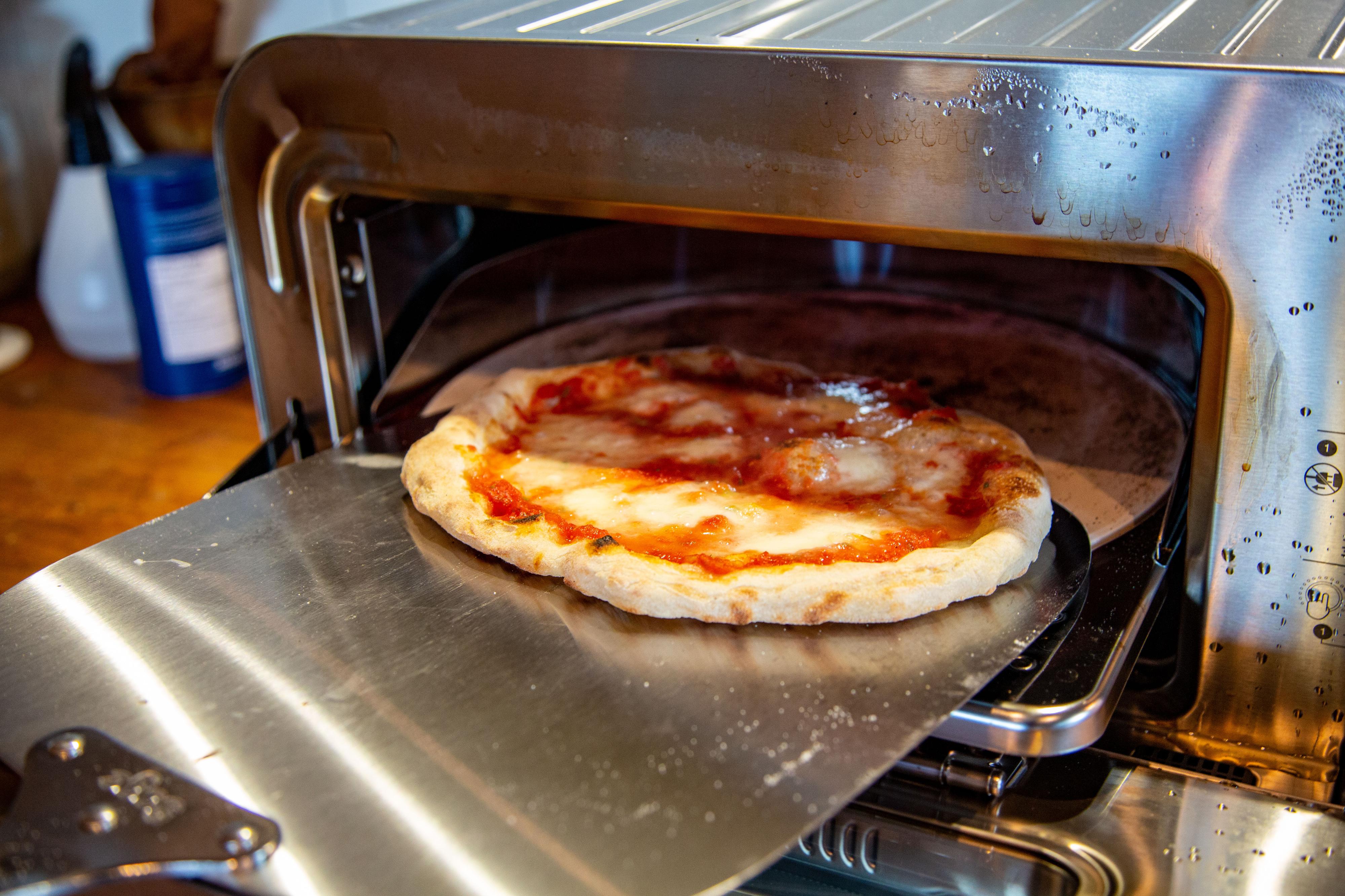 Pizza stekt med manuell modus aktivert.